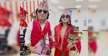 Deepak Raj Giri & Deepa Shree Niraula wearing Nepali Dhaka Topi (cap)