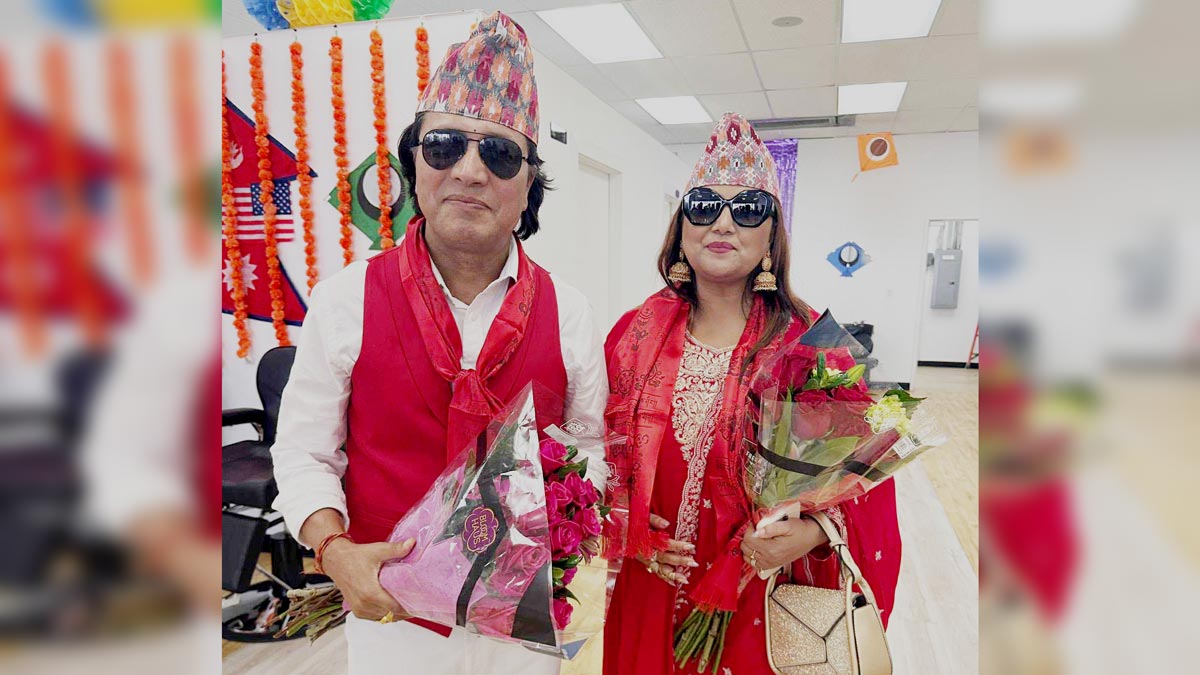 Deepak Raj Giri & Deepa Shree Niraula wearing Nepali Dhaka Topi (cap)