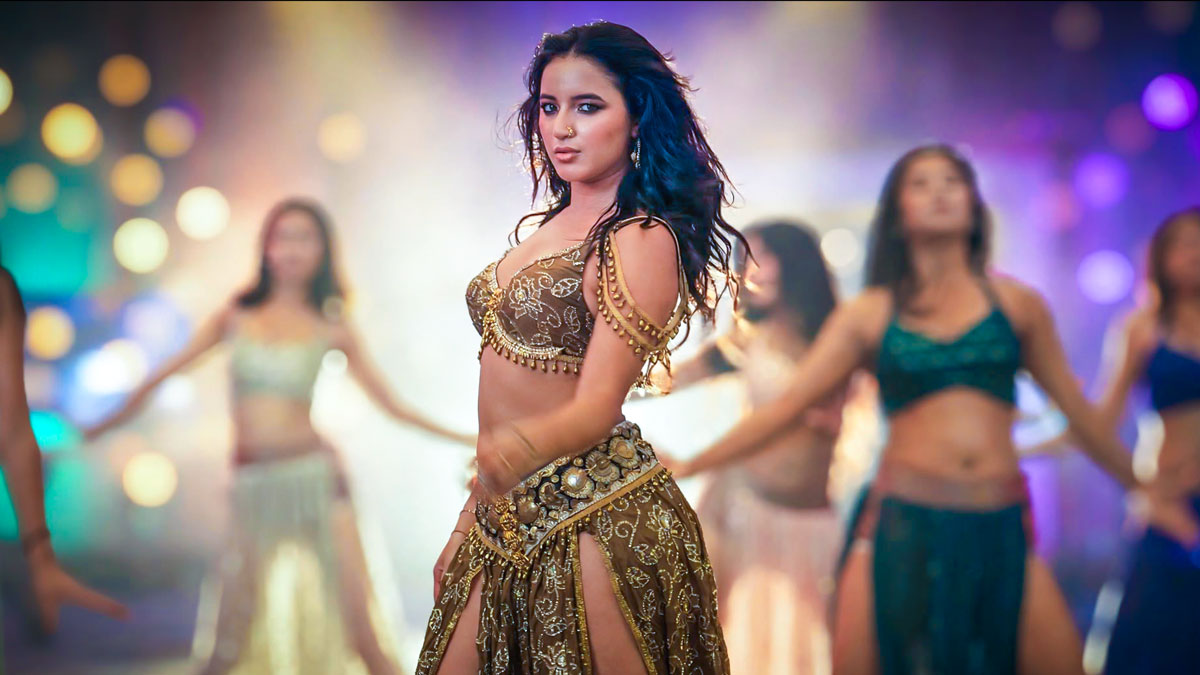 Eva Giri dances in a gold-embellished outfit with background dancers under colourful lights in Panch Pandav&rsquo;s song &ldquo;Raja Chahiya Chha.&rdquo;
